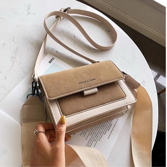 Tan Crossbody Bag with Structured Design and Versatile Style - Picture 1 of 7